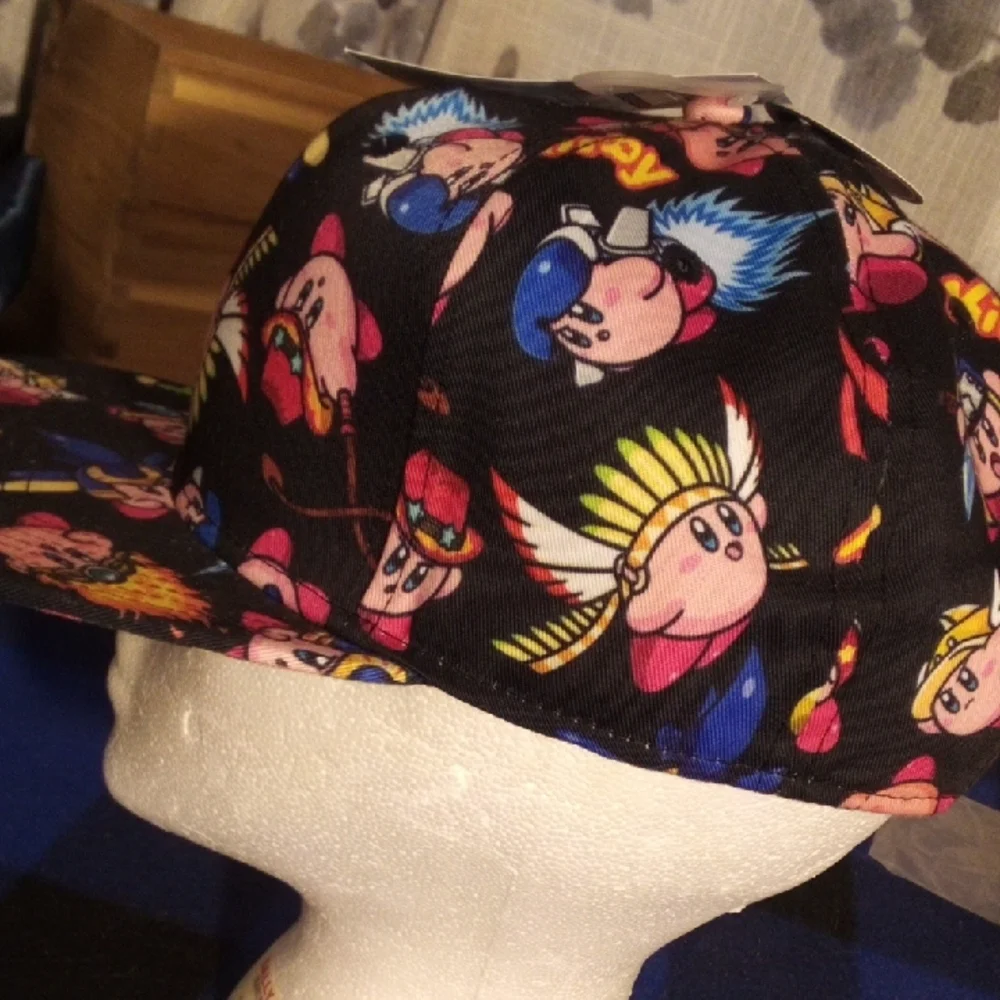 Bioworld Kids Black Kirby Pattern Snapback Hat with Pink, Blue & Yellow Accents